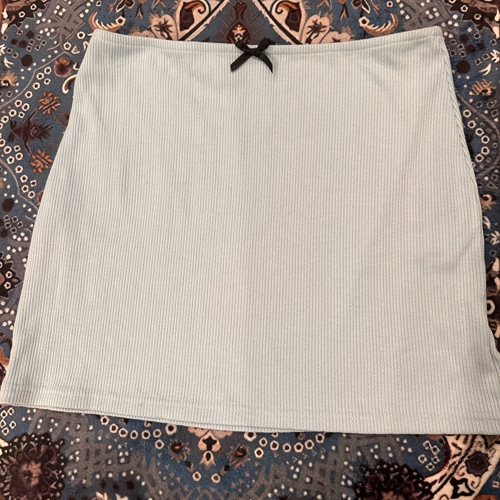 Used Princess Polly Light Blue mini skirt with mini bow Medium 38 us 6